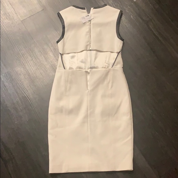 Beautiful white knee length Dress. - Picture 3 of 7